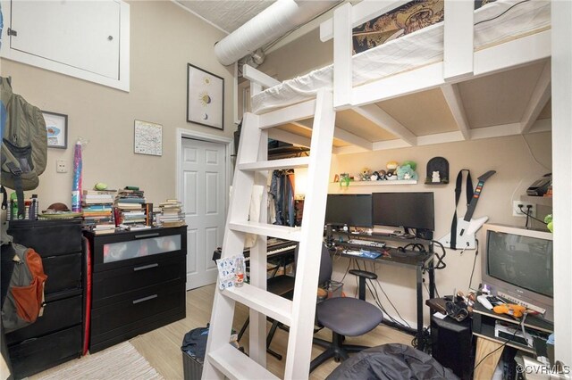 1701 W Leigh St, Richmond, VA 23220 - bedroom featuring an office area and wood finished floors