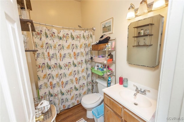 1701 W Leigh St, Richmond, VA 23220 - bathroom featuring vanity, toilet, wood finished floors, and curtained shower