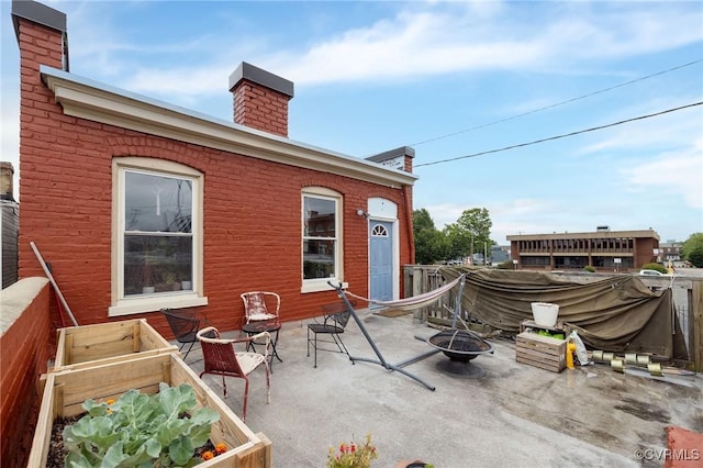 1701 W Leigh St, Richmond, VA 23220 - view of patio with a fire pit