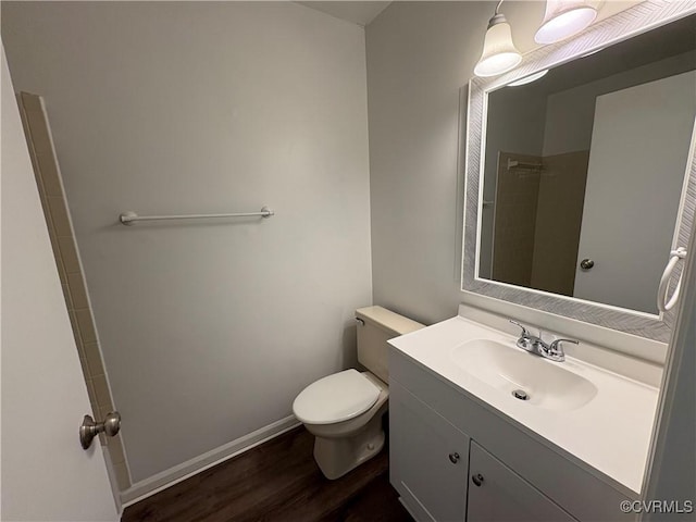 9394 Wind Haven Ct Unit 309, Henrico, VA 23060 - bathroom featuring toilet, vanity, and wood finished floors