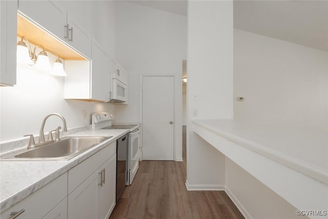 9394 Wind Haven Ct Unit 309, Henrico, VA 23060 - kitchen featuring a sink, white appliances, dark wood finished floors, white cabinetry, and light countertops