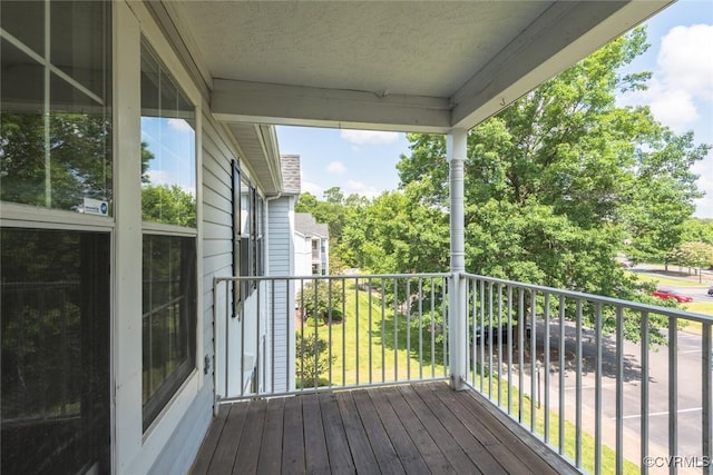 9394 Wind Haven Ct Unit 309, Henrico, VA 23060 - wooden deck featuring view of wooded area