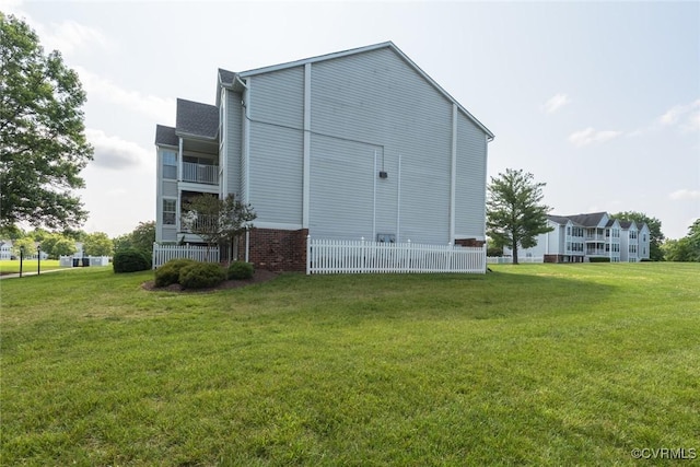 9394 Wind Haven Ct Unit 309, Henrico, VA 23060 - view of side of property with a lawn