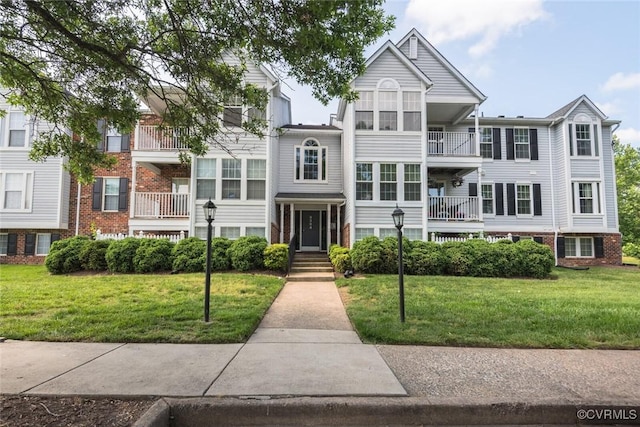 9394 Wind Haven Ct Unit 309, Henrico, VA 23060 - multi unit property featuring a front yard and brick siding