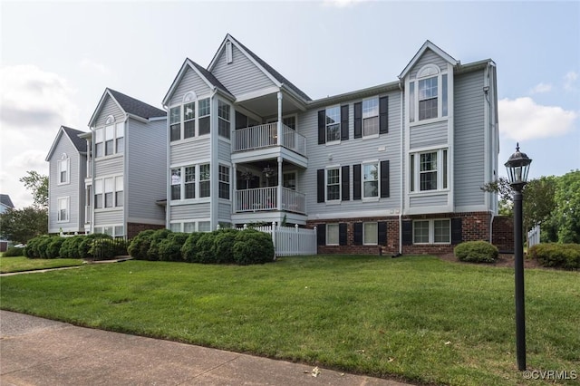 9394 Wind Haven Ct Unit 309, Henrico, VA 23060 - view of front of property with brick siding and a front yard