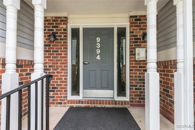 9394 Wind Haven Ct Unit 309, Henrico, VA 23060 - doorway to property with brick siding and a porch