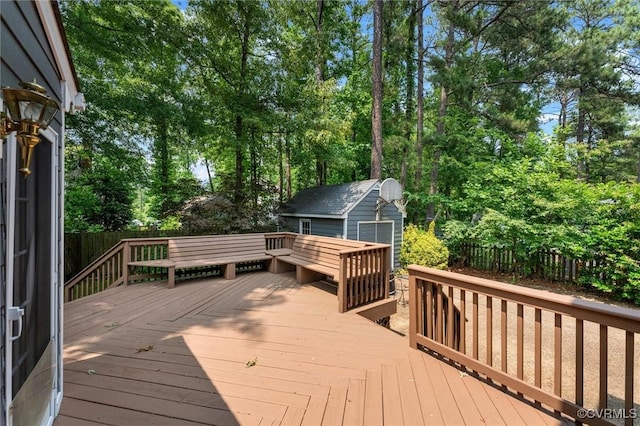 2730 Dalkeith Dr, Henrico, VA 23233 - wooden deck with a fenced backyard, an outdoor structure, and view of wooded area