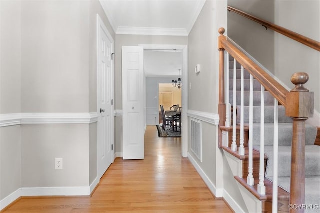 2730 Dalkeith Dr, Henrico, VA 23233 - hall with light wood-style flooring, stairs, ornamental molding, and baseboards