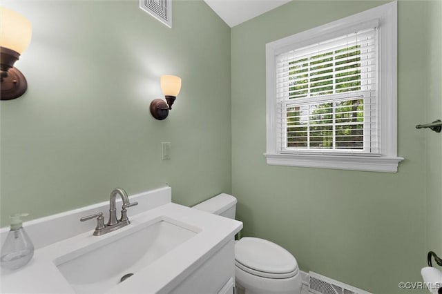 2730 Dalkeith Dr, Henrico, VA 23233 - half bathroom with toilet, vanity, and baseboards