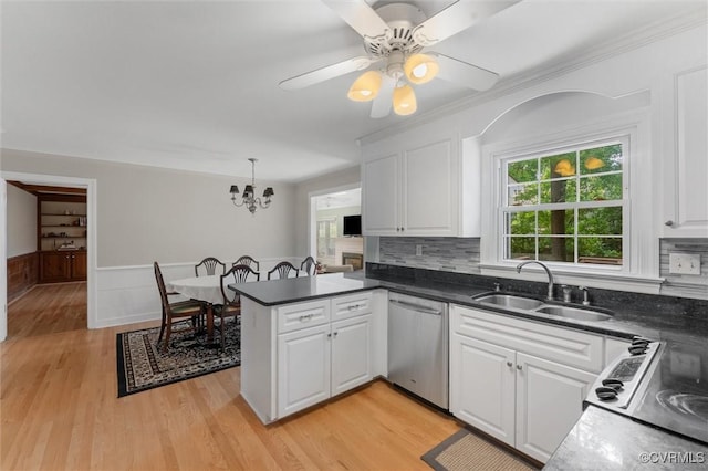 2730 Dalkeith Dr, Henrico, VA 23233 - kitchen with stainless steel appliances, a sink, white cabinetry, a peninsula, and plenty of natural light