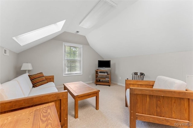 2730 Dalkeith Dr, Henrico, VA 23233 - living room featuring a skylight, light colored carpet, baseboards, and lofted ceiling