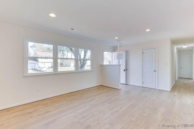 525 Helm Dr, Newport News, VA 23602 - unfurnished room with light wood finished floors, baseboards, and recessed lighting