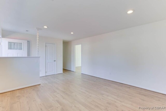 525 Helm Dr, Newport News, VA 23602 - spare room featuring wood finished floors, recessed lighting, and baseboards