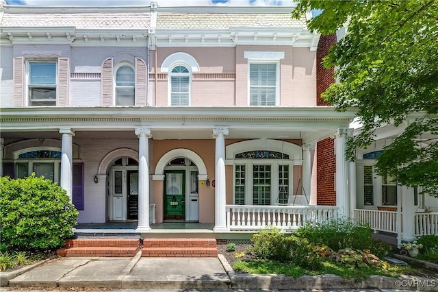 2210 Stuart Ave, Richmond, VA 23220 - entrance to property featuring brick siding and a porch
