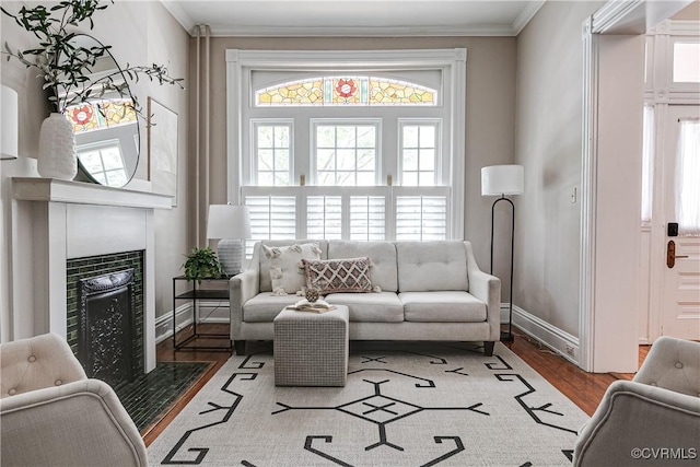 2210 Stuart Ave, Richmond, VA 23220 - living room with plenty of natural light, baseboards, crown molding, and a fireplace with flush hearth