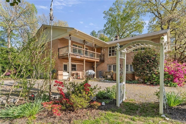 2133 Bloomsherry Dr, Chesterfield, VA 23235 - rear view of house featuring a balcony, brick siding, and a ceiling fan