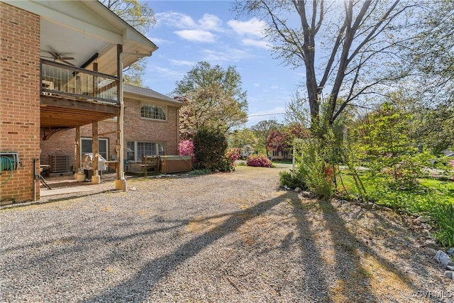 2133 Bloomsherry Dr, Chesterfield, VA 23235 - view of yard with a hot tub, a balcony, ceiling fan, and a patio