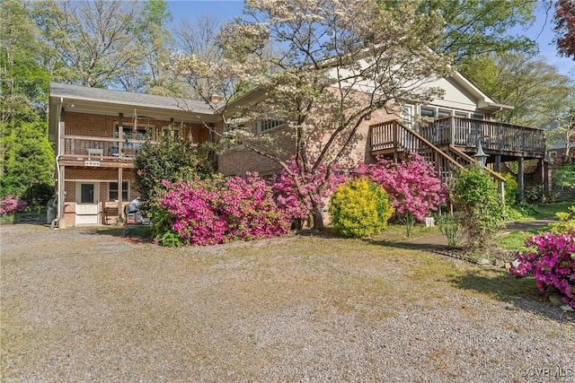 2133 Bloomsherry Dr, Chesterfield, VA 23235 - rear view of house with brick siding, stairs, and a deck