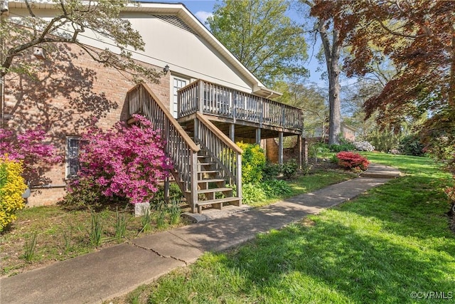 2133 Bloomsherry Dr, Chesterfield, VA 23235 - view of home's exterior with stairway, a deck, a yard, and brick siding