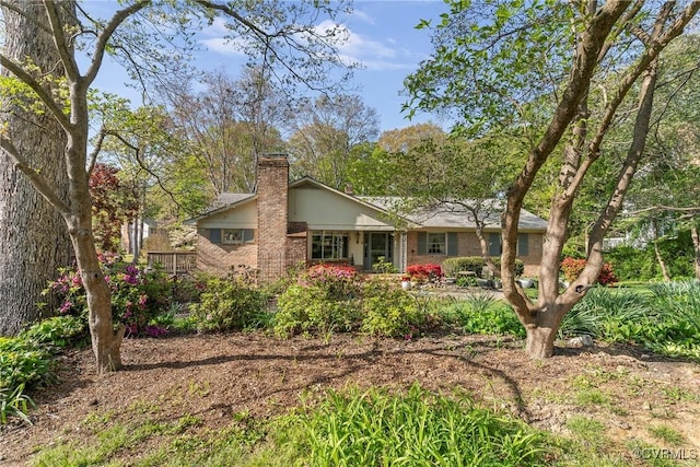 2133 Bloomsherry Dr, Chesterfield, VA 23235 - back of house with a chimney and brick siding