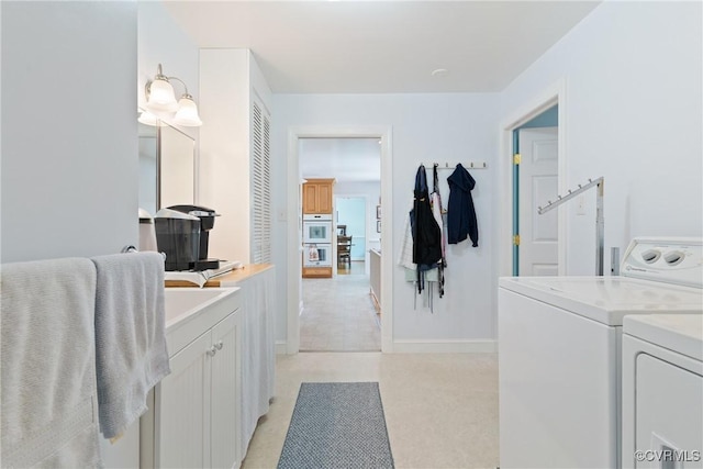 2133 Bloomsherry Dr, Chesterfield, VA 23235 - laundry area featuring cabinet space, washing machine and clothes dryer, and baseboards