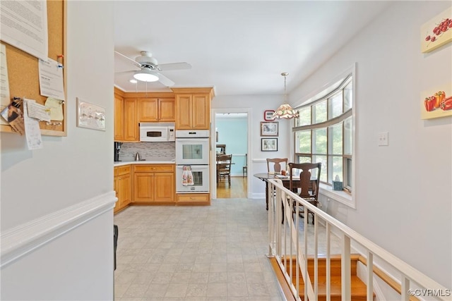 2133 Bloomsherry Dr, Chesterfield, VA 23235 - kitchen featuring white appliances, light countertops, backsplash, hanging light fixtures, and a ceiling fan