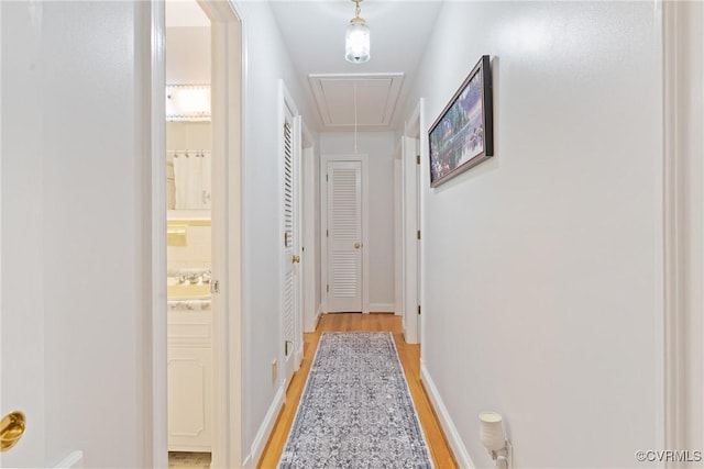 2133 Bloomsherry Dr, Chesterfield, VA 23235 - corridor with attic access, light wood-style floors, and baseboards