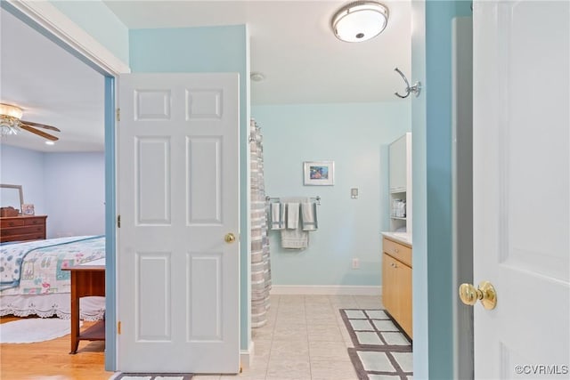 2133 Bloomsherry Dr, Chesterfield, VA 23235 - bathroom with vanity, ceiling fan, ensuite bath, a shower with shower curtain, and baseboards