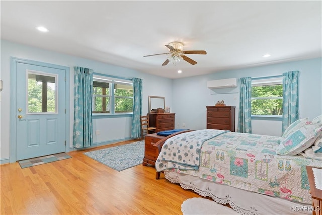 2133 Bloomsherry Dr, Chesterfield, VA 23235 - bedroom with a wall unit AC, wood finished floors, recessed lighting, and a ceiling fan