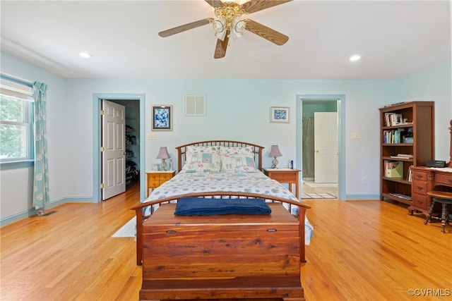 2133 Bloomsherry Dr, Chesterfield, VA 23235 - bedroom featuring light wood-style flooring, baseboards, recessed lighting, ensuite bathroom, and a walk in closet