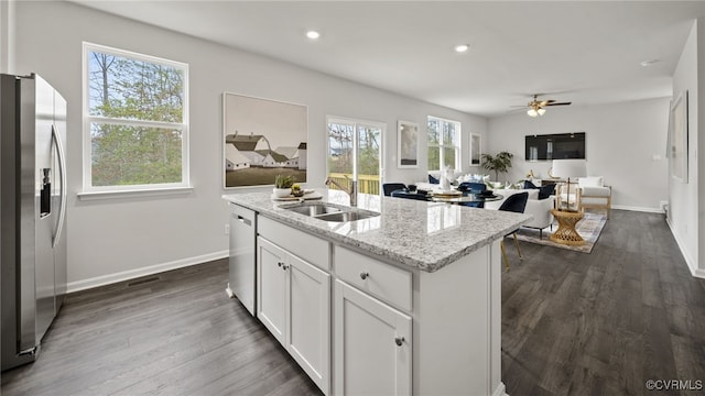 111 Leonard Ct, King William, VA 23009 - kitchen featuring appliances with stainless steel finishes, a sink, a ceiling fan, baseboards, and dark wood-type flooring