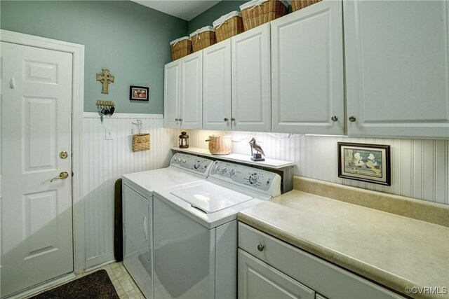 423 Elm Creek Dr, Manakin Sabot, VA 23103 - laundry room featuring cabinet space, washer and clothes dryer, and a wainscoted wall