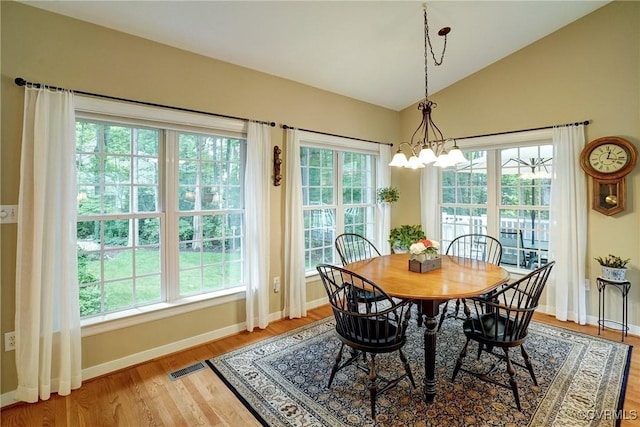 423 Elm Creek Dr, Manakin Sabot, VA 23103 - dining space with baseboards, lofted ceiling, light wood-style flooring, and plenty of natural light