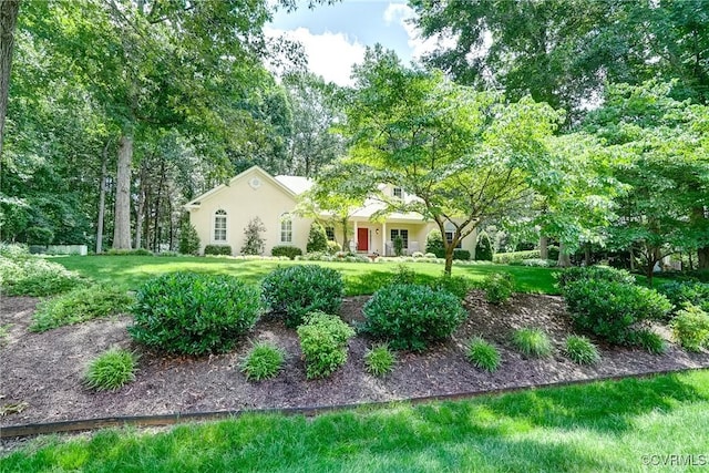 423 Elm Creek Dr, Manakin Sabot, VA 23103 - view of front of house with a front yard and stucco siding