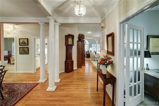 423 Elm Creek Dr, Manakin Sabot, VA 23103 - foyer entrance with light wood-type flooring, ornamental molding, ornate columns, baseboards, and a chandelier
