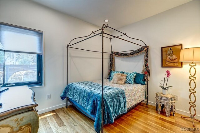 26171/2 Floyd Ave, Richmond, VA 23220 - bedroom with light wood finished floors and baseboards
