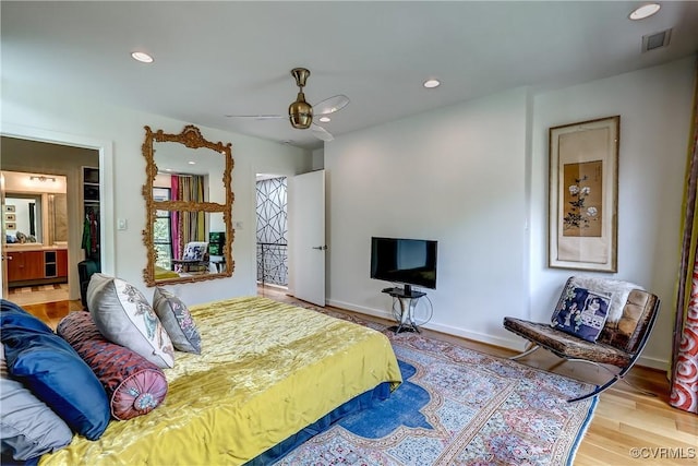 26171/2 Floyd Ave, Richmond, VA 23220 - bedroom featuring wood finished floors, ceiling fan, and recessed lighting
