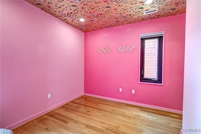 26171/2 Floyd Ave, Richmond, VA 23220 - spare room with light wood finished floors and recessed lighting