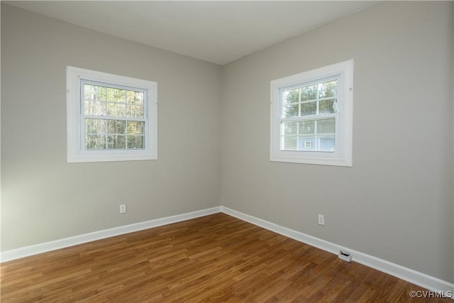 11512 Duncan Rd, Dinwiddie, VA 23805 - spare room featuring baseboards and wood finished floors