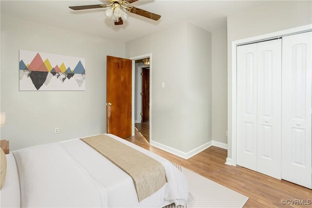 11512 Duncan Rd, Dinwiddie, VA 23805 - bedroom with wood finished floors, a closet, baseboards, and a ceiling fan