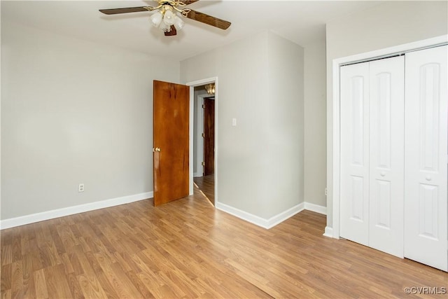 11512 Duncan Rd, Dinwiddie, VA 23805 - unfurnished bedroom with light wood-style flooring, a closet, baseboards, and a ceiling fan