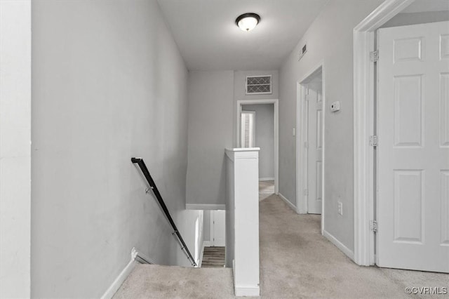 1317 N 22nd St, Richmond, VA 23223 - staircase with carpet and baseboards