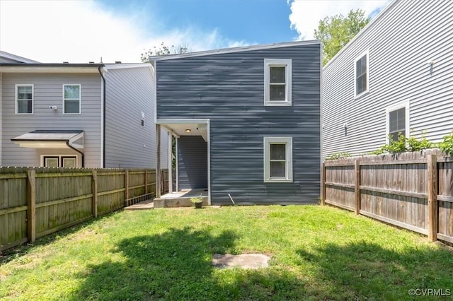 1317 N 22nd St, Richmond, VA 23223 - rear view of property featuring a fenced backyard
