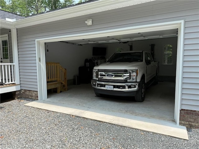 1205 Trimmers Shop Rd, West Point, VA 23181 - garage featuring driveway
