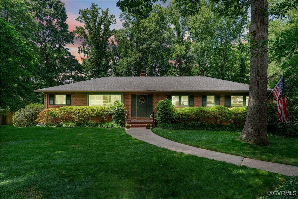 7600 Yarmouth Dr, North Chesterfield, VA 23225 - ranch-style house featuring a front yard, brick siding, and a chimney