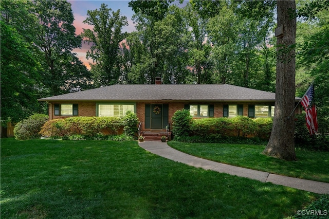 7600 Yarmouth Dr, North Chesterfield, VA 23225 - ranch-style house featuring a front yard, brick siding, and a chimney