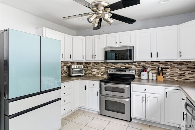 119 Monath Rd, Richmond, VA 23236 - kitchen featuring stainless steel appliances, ceiling fan, backsplash, and light tile patterned floors