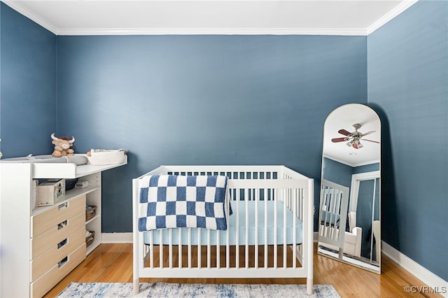 119 Monath Rd, Richmond, VA 23236 - bedroom featuring wood finished floors, crown molding, and a crib