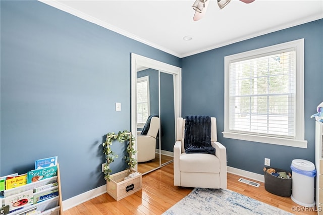 119 Monath Rd, Richmond, VA 23236 - living area with crown molding, a ceiling fan, and wood finished floors