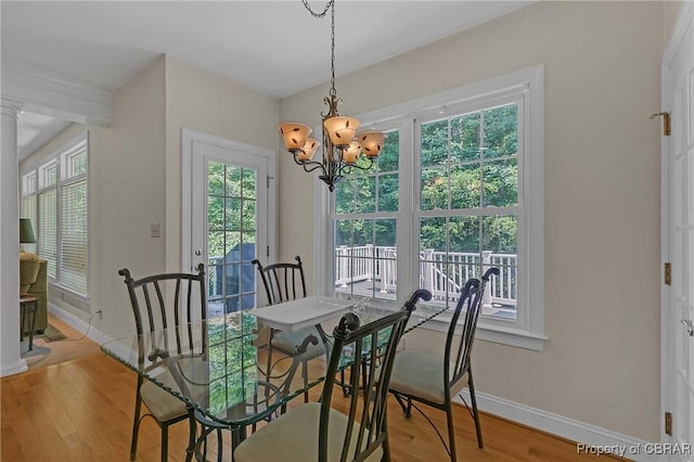 1708 Centennial Dr, Toano, VA 23168 - dining space featuring wood finished floors and a chandelier
